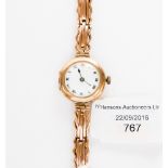 An early 20th Century ladies' rose gold bracelet watch, original 9 ct gold strap,