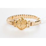 A ladies Omega gold plated bracelet watch (cased)