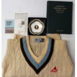 Cricket memorabilia: a Derbyshire County Cricket club sweater with Bass red triangle sponsorship