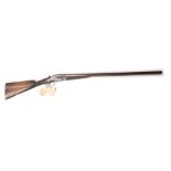 A 12 bore 2 1/2" chambered side by side,