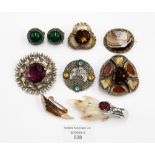 A collection of Scottish costume jewellery including brooches,