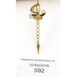 A gold, opal and seed pearl brooch, as a sword, 3.