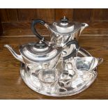 Elkington & Co, a silver plated four piece tea service, of plain Neo-classical boat form,