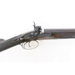 An antique 10 bore side by side percussion shotgun by J.