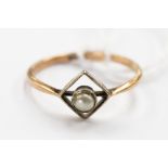 A 9 ct gold dress ring set with a pearl, ring size 'M', gross weight 1.3 grms approx.