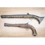 Two decorative reproduction pistols inlaid with mother-of-pearl