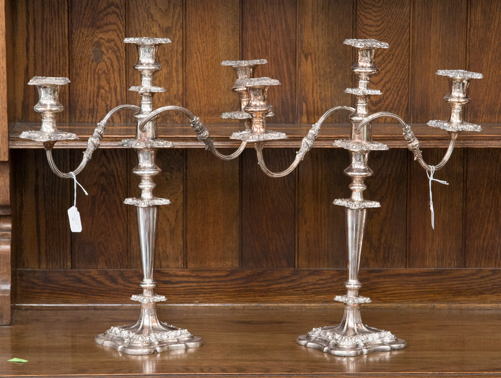 A pair of EP on copper three branch candelabra