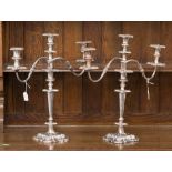 A pair of EP on copper three branch candelabra