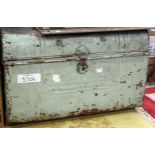 A tin trunk containing a large collection of wood working planes.