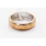 A 9ct textured yellow gold wedding band, approximately 6g,