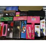 A box of sixteen boxed Barbie Dolls, TV and film themed,