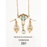 A 9 ct gold Edwardian style pendant necklace and earrings, set with aquamarine and seed pearl,