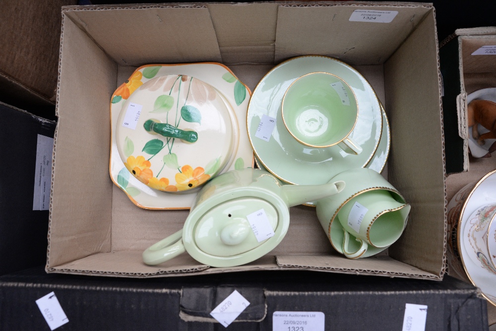 A 1930s bachelor's set by 'Bisto' England, together with a muffin dish and cover hand painted,