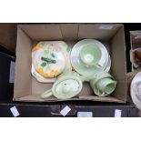 A 1930s bachelor's set by 'Bisto' England, together with a muffin dish and cover hand painted,
