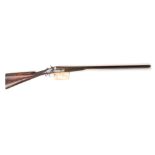 A 12 bore 2 1/2" chambered side by side hammer gun black powder proved by James McCririck & Sons,