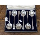 A set of six silver soup spoons