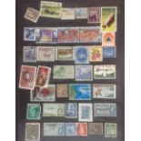 Worldwide collection of stamps in four albums, mixed condition,