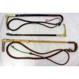 Two white metal collared and antler handled hunting crops with thongs,