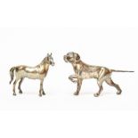 A silver model of a pointer dog and another of a horse,