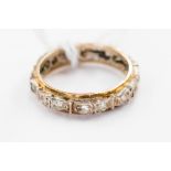 A silver and 9 ct gold full eternity ring, white stone SRT, ring size 'L' gross weight 2.