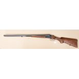 A 12 bore side by side 2 3/4 inch approx chambered boxlock non ejector shot gun, by Baikal