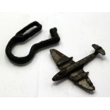 Belt hangers, 14th /15th Century, zoomorphic and a child's toy Gloster Meteor Jet aircraft, 1940s.