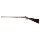 An antique 15 guage side by side percussion shotgun by H.