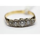 A five stone diamond ring, 18ct and platinum,