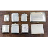 A large collection of assorted silver vesta cases, plus a cigarette case,
