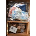 An album and box of World and UK coins and banknotes (2)