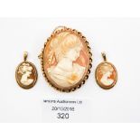 A 9ct rose gold mounted cameo, measuring approx 50 by 40 mm with safety chain,