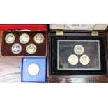 Seven Queen Elizabeth II traditional Crown numismatic set coins (500 silver) with certificate in