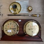 A reproduction ships barometer and clock with certificate,