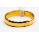 A 22ct gold wedding ring, approximately 4mm, gross weight approximately 6.