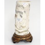 A late 19th Century Japanese Meiji period carved ivory tusk vase,