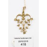 An Edwardian seed pearl and gold pendant, marked 9ct on fine gold chain marked 375,