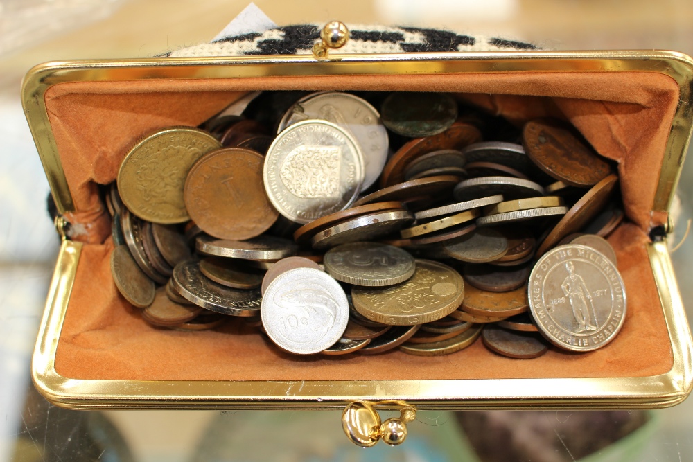 Purse with bag of various coins