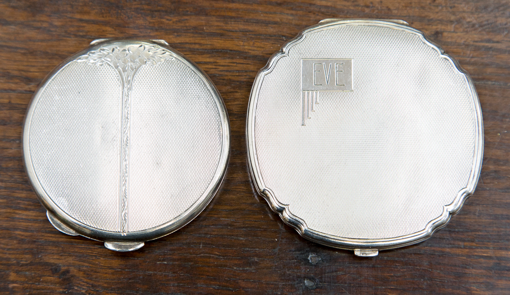 A Walker and Hall silver powder compact, Chester 1955, with a further silver powder compact,