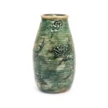 A small Martin Brothers spill vase, decorated with various fish, etc, dated 1913,