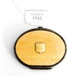 A steel and ivory Regency purse with shield shape ivory cartouche