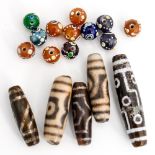 ***AMENDED GUIDE*** A collection of glass beads,