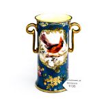 A Royal Doulton twin handled spill vase, printed and tinted with an exotic bird, Sevres style,