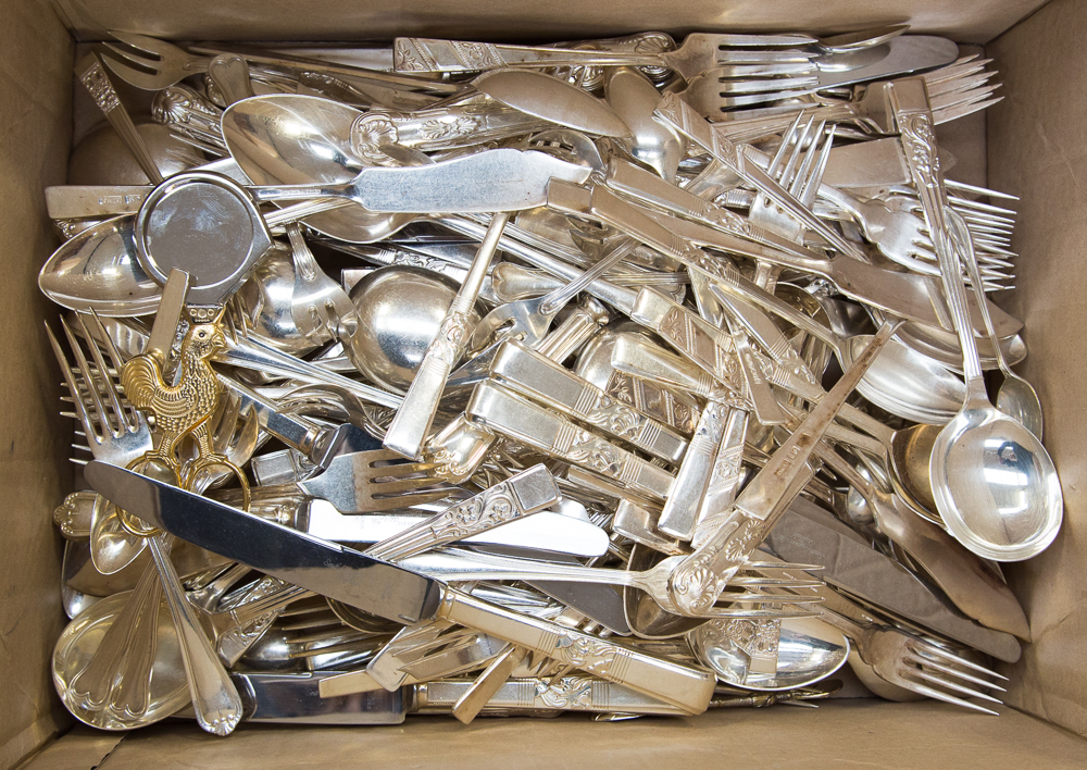 A collection of plated cutlery,