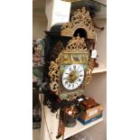 A wall hanging Austrian clock with hand painted scenes and moulded metal decoration (1)