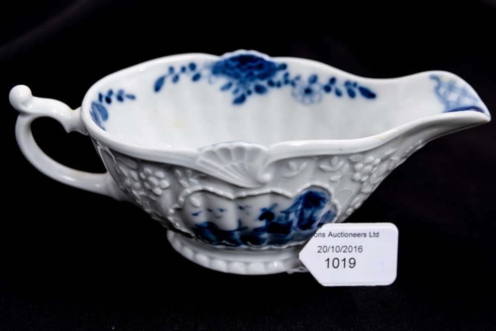 An 18th Century blue and white sauce boat,