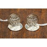 A pair of Edward VII silver menu holders in an an Art Nouveau style with floral decoration,