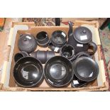 A box of Wedgwood black basalt ware to include a restored E.