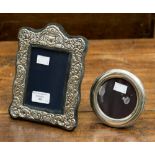 A modern embossed silver photo frame;