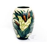 A Moorcroft Lavina pattern baluster vase,