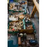 A large collection of carved wood ornaments and boxes, Cuckoo clock, binoculars,